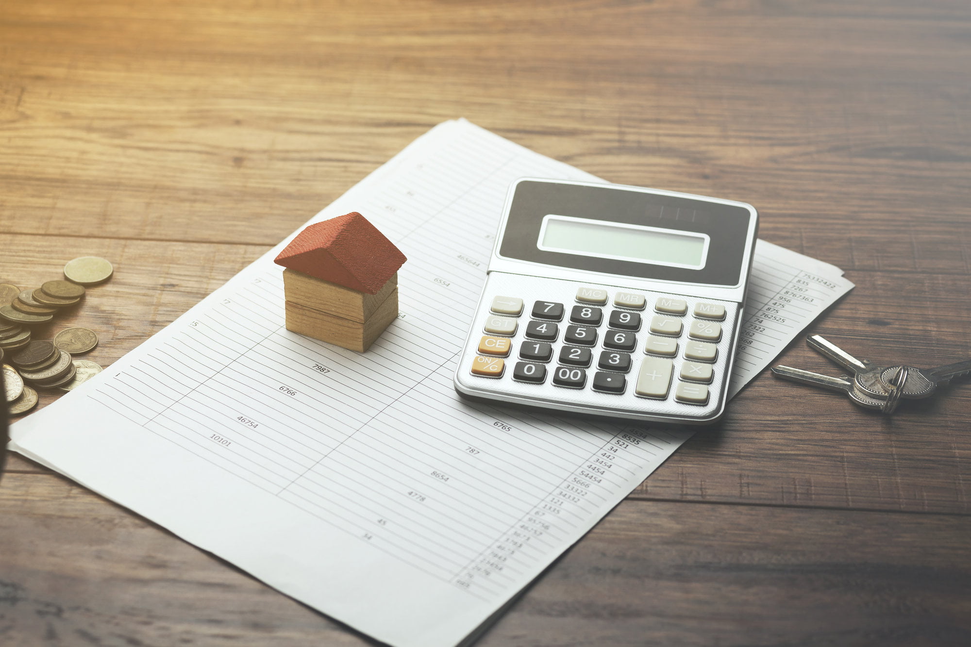 home sales, house,calculator and key on document