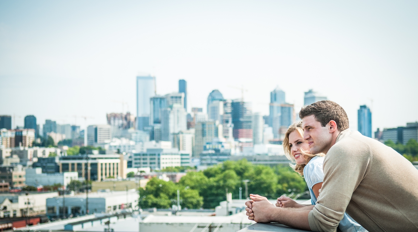 Young couple sitting on the sidelines to buy a home