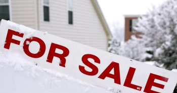 For sale sign in the winter