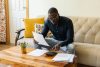 A man calculating his home affordability